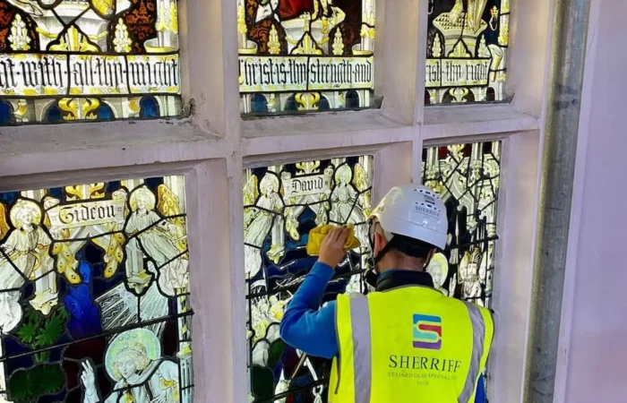 Sherriff Stained Glass specialist working on stained glass windows